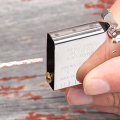 Wick being inserted through the bottom of an empty insert